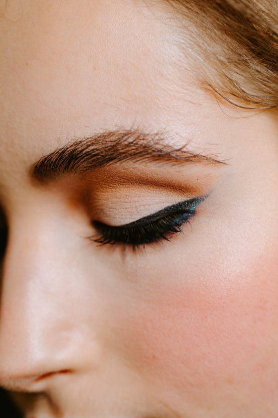 A close up of the eye with black eyeliner