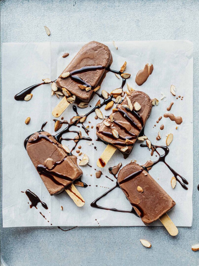 A close up of some ice cream on a stick