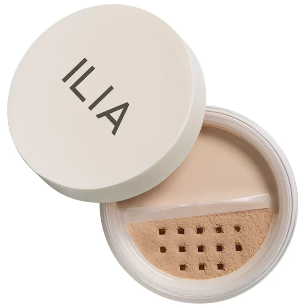 A close up of the lid of an open powder compact