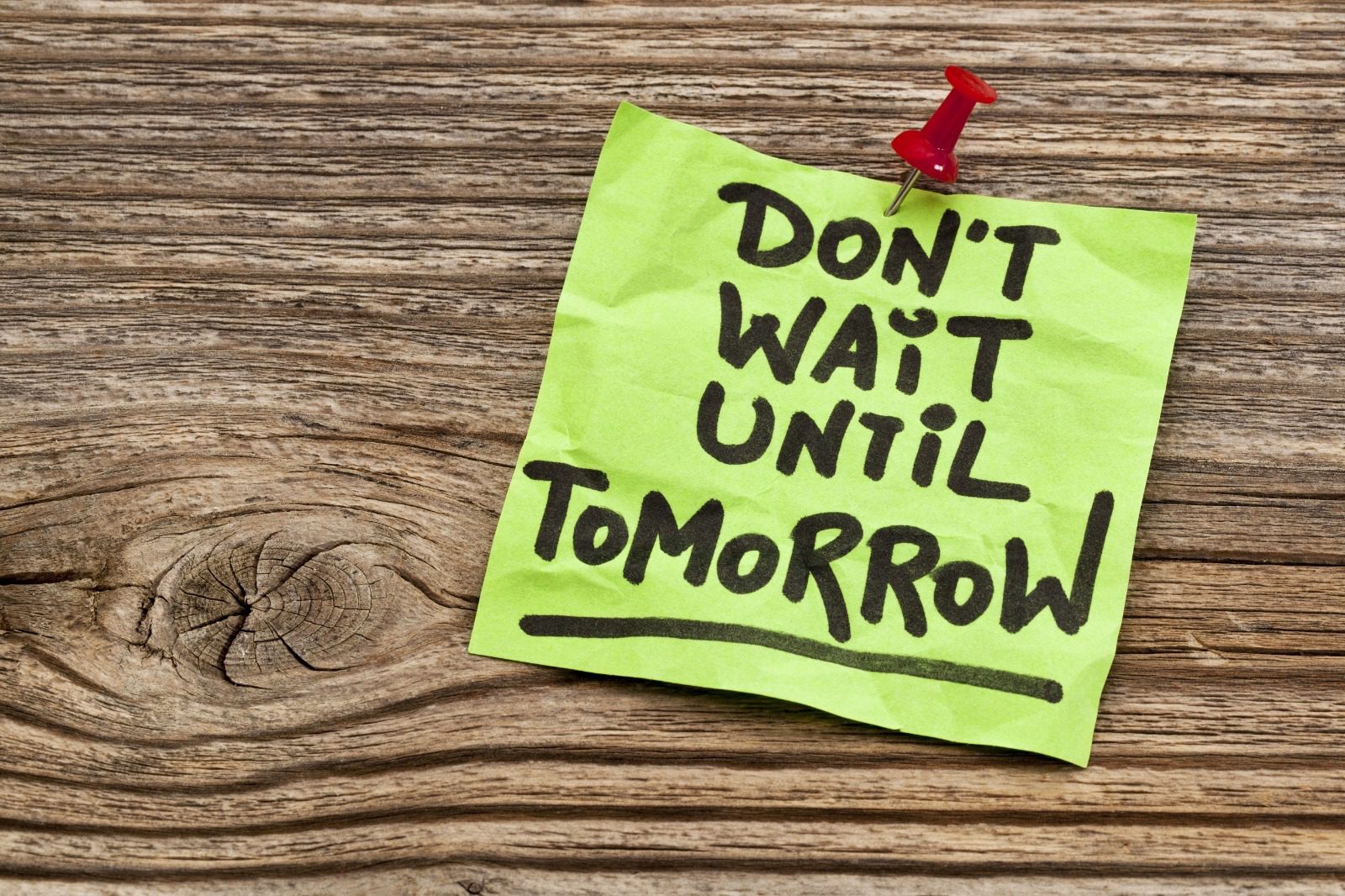 A note that says don 't wait until tomorrow